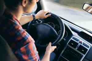 Car interior with driver on NC road – ideal for beginner driving practice